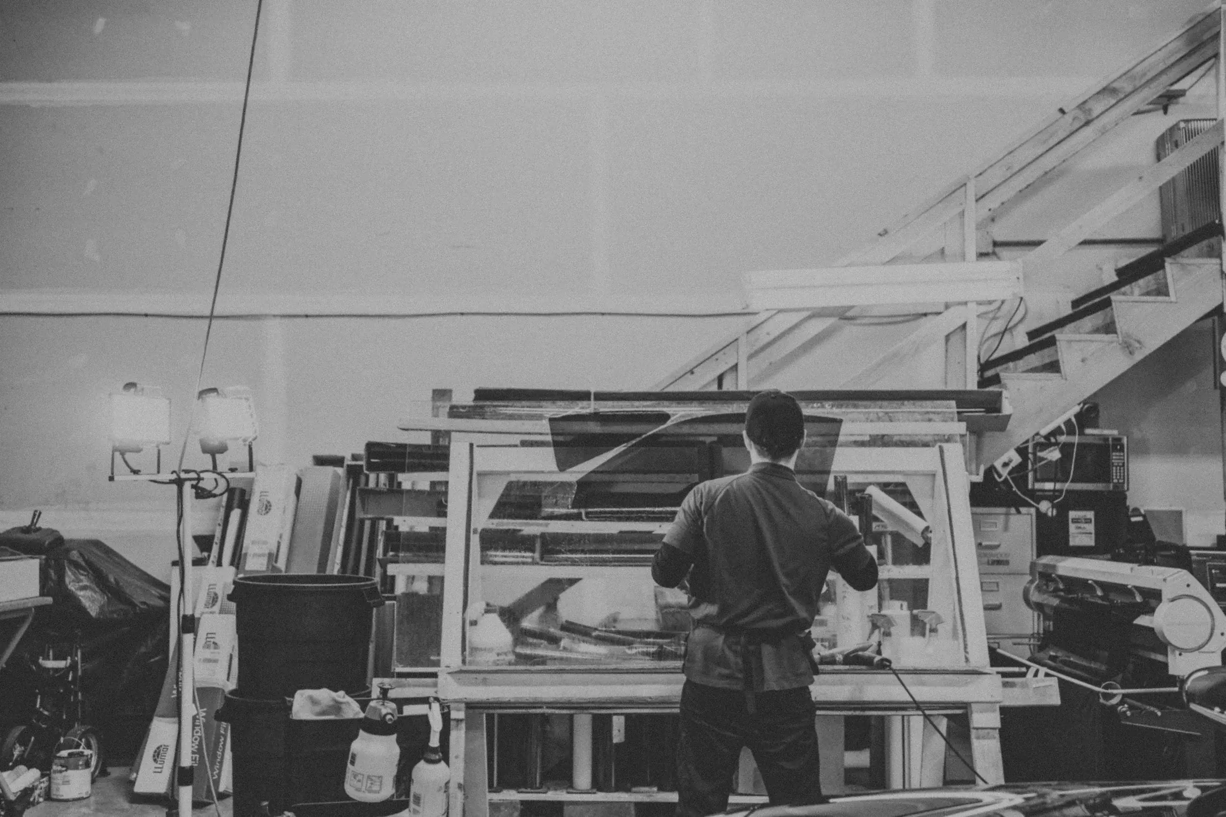 Wide black and white view of the shop