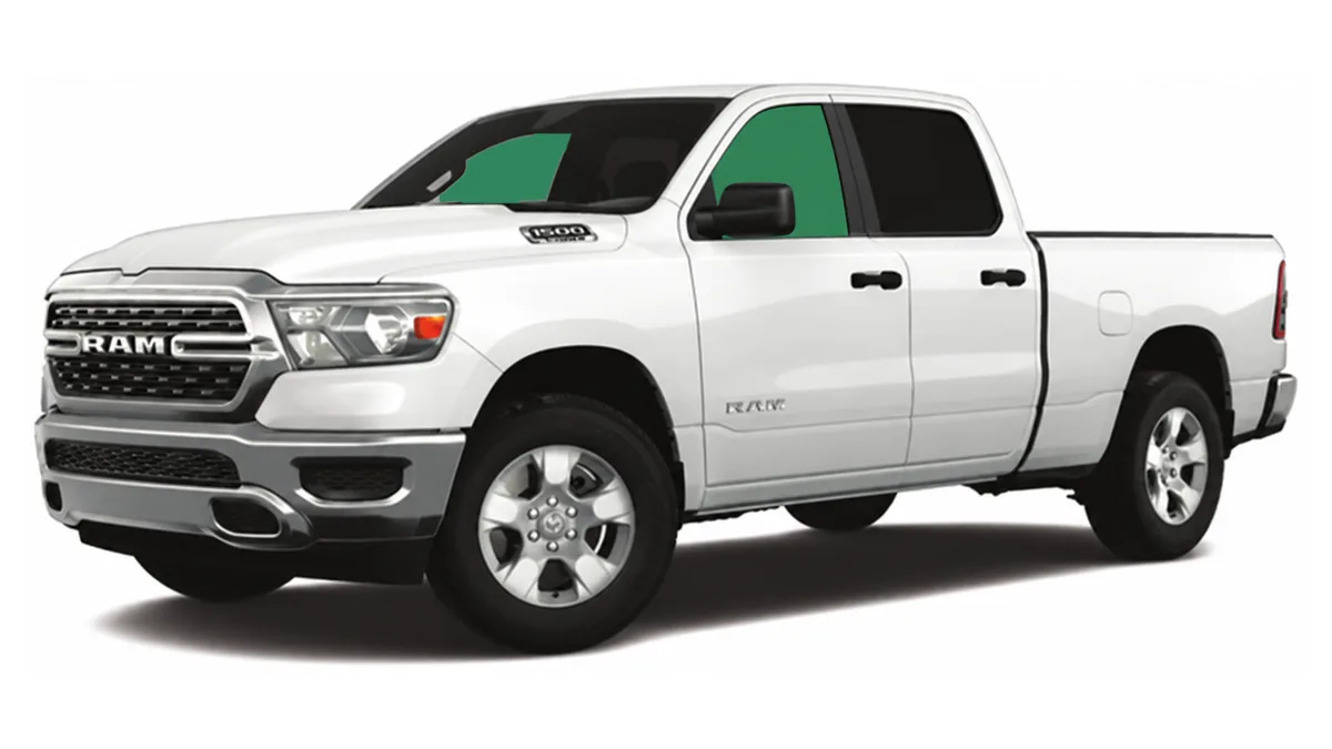 White Ram pickup in three-quarter view with the front door window shaded to show the tinted glass